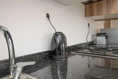 a mixer sitting on a counter in a kitchen at plénitude in Mohammedia