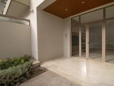 a pivot door of a house with glass at plénitude in Mohammedia