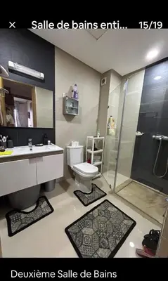 a bathroom with a sink and a toilet and a shower at Hébergement idéal pour conjuguer tourisme, affaires et télétravail in Mohammedia
