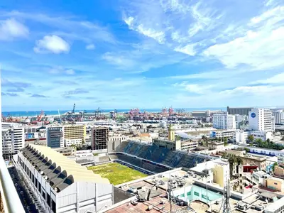 a view of a large city with buildings at Terrace & View of Casablanca Port in Casablanca