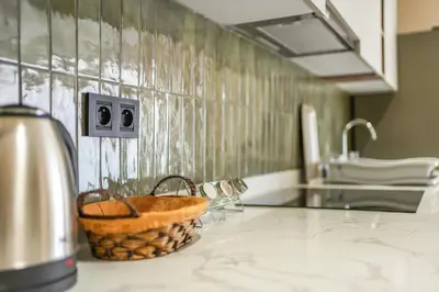 a kitchen counter with a basket on a counter top at Studio moderne in the Heart of Maarif Casablanca in Casablanca