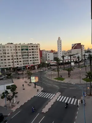 a city street with a crosswalk in a city at Votre Cocon Moderne - Central & tout confort in Casablanca