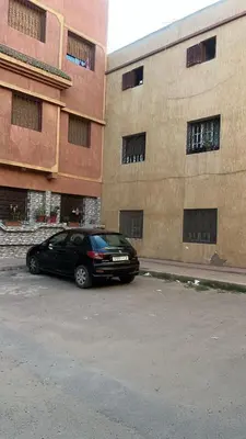 a black car parked in front of a building at Chez binette in Casablanca