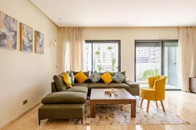 a living room with a couch and a table at Harcay CFC in Casablanca