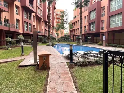 a swimming pool in the middle of a building at Harcay CFC in Casablanca