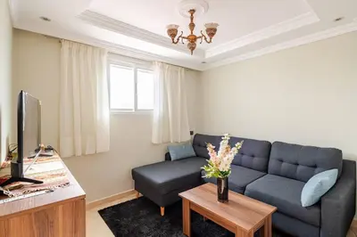 a living room with a couch and a table at Layover Guest House - Studio Rabat City Center - 4th Floor in Rabat