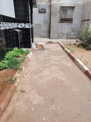 an empty driveway in front of a building at Casa Hasna in Casablanca