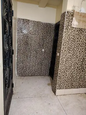 a bathroom with a wall covered in animal prints at Casa Hasna in Casablanca
