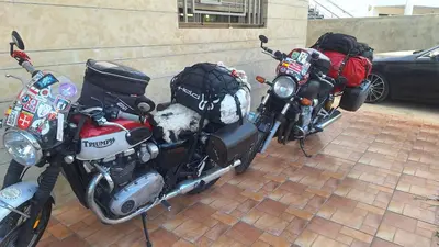 two motorcycles are parked next to each other at Chambres au sein d'une villa in Rabat