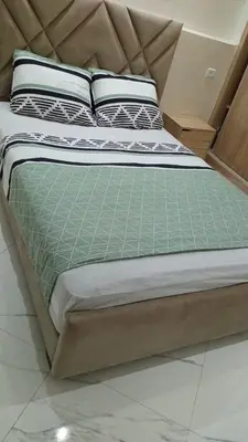 a large bed in a room with at Nid d'anges in Bouznika