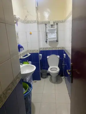 a small bathroom with a toilet and a sink at Comfort and Convenience in Casablanca