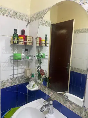 a bathroom with a sink and a mirror at Comfort and Convenience in Casablanca