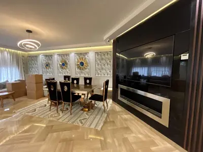 a dining room with a table and chairs at Escape for the whole family in Casablanca