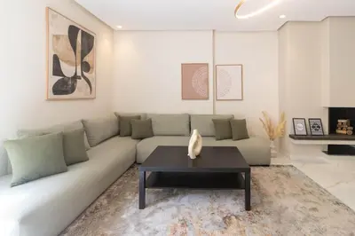 a living room with a couch and a coffee table at BRYJ 34 Luxury studio les princesses maarif in Casablanca
