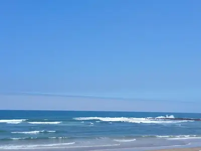 a view of the ocean from the beach at Cozy Studio Vue sur Piscine à Ocean Park Zenata City Eco in Aïn Harrouda