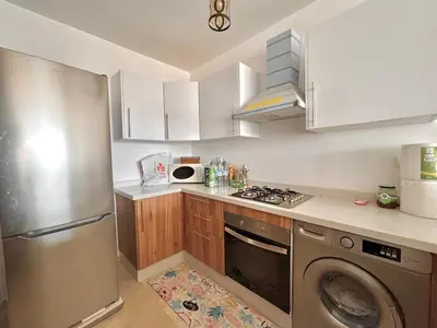 a kitchen with a stainless steel refrigerator and a dishwasher at La perla del Atlántico in Casablanca