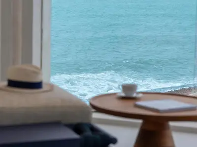 a view of the ocean from a room with a table at STORY Le Carrousel Rabat in Rabat