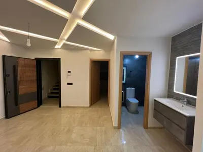 a bathroom with a sink and a toilet at 322 Costa beach , Bouznika in Bouznika