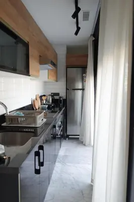 a kitchen with a stainless steel refrigerator and counters at Calm and lovely appartement well located in Casablanca