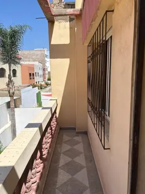 a balcony of a building with a view of a street at Villa Chérine in Casablanca
