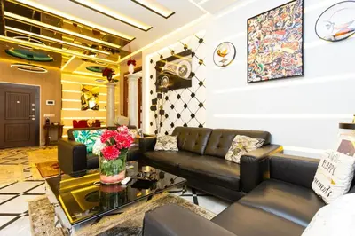 a living room with a couch and a table at Anfa Studio Sea View in Casablanca