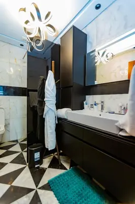 a bathroom with a large tub and a sink at Anfa Studio Sea View in Casablanca
