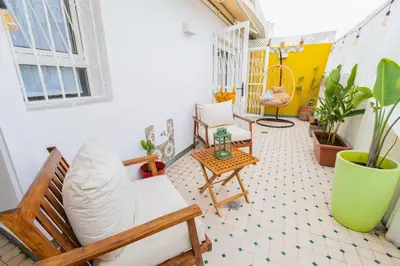 a living room with a couch and a table at Casa JOY in Casablanca