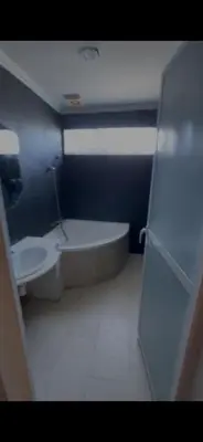 a small bathroom with a toilet and a sink at Petit Nid Casablanca in Casablanca