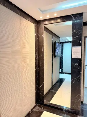 a mirror in a room with blinds at Cosy Modern Retreat in Casablanca in Casablanca