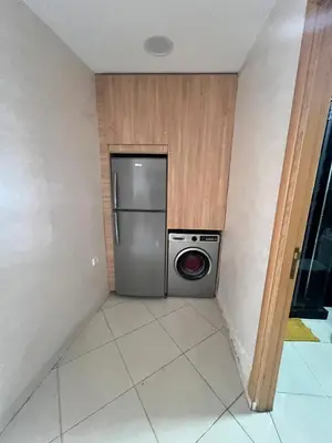 a laundry room with a washing machine in it at Casablanca luxury Studio in Casablanca