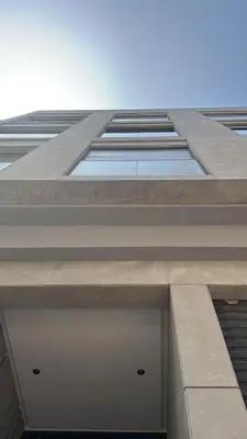 a tall building with a window on the side of it at Chic Studio Near Beach & Cafés in Casablanca