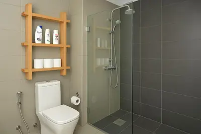 a bathroom with a toilet and a glass shower at Lux apartment, wifi, Netflix, parking in Casablanca