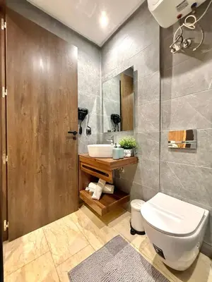 a bathroom with a toilet and a sink at App Chic & Jacuzzi à Bourgogne près de la Corniche in Casablanca-Port