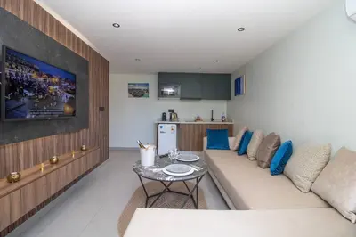 a living room with a couch and a table at Elegant Studio - Quiet & Stylish in Casablanca