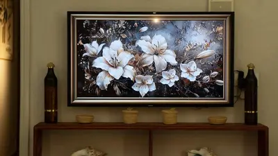 a picture of flowers on top of a shelf at Yaqcha Home in Casablanca