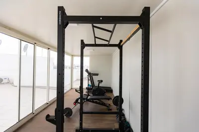 a gym with treadmills and weights in a room at Elegant Studio in Maarif - Gym access & Free Parking & Wifi Fiber in Casablanca
