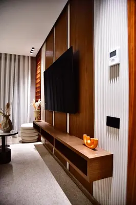 a living room with a tv on a wall at Le Sublime in Casablanca
