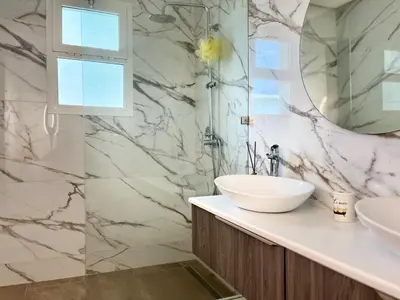 a bathroom with a sink and a mirror at Charming villa in a coastal area in Casablanca