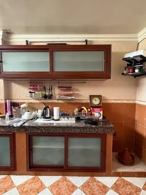 a kitchen with a counter top in a room at Summer sale two bedroom APT Near downtown in Casablanca