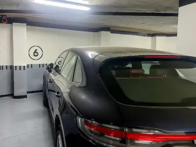 a black car parked in a parking garage at Maya Suites - Premium Luxury Stay in Casablanca