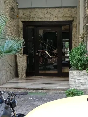 a bike parked in front of a door at A Cozy escape in Morocco in Casablanca