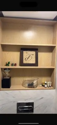 a room with a shelf with a picture on it at CityCore duplex in Casablanca