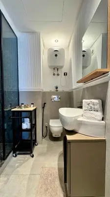 a bathroom with a sink and a toilet at Urban Apartment 2 Mars - By AppartAli in Casablanca