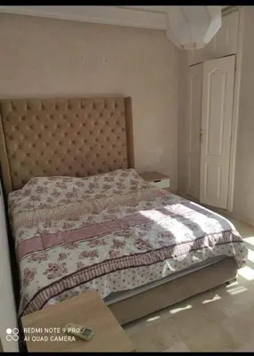 a bedroom with a bed with a quilt on it at اقامة فال دانفا in Casablanca