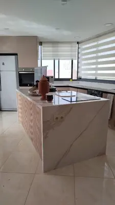 a kitchen with a counter with a vase on it at Spacious Apartment with Panoramic Ocean Views in Casablanca
