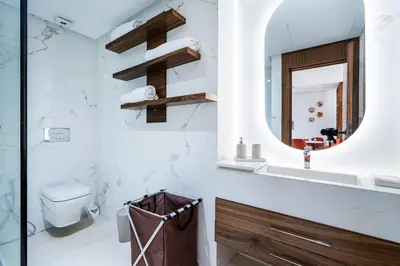 a bathroom with a sink and a mirror at Terracotta Chic Studio Cosy Les Princesses Casablanca in Casablanca