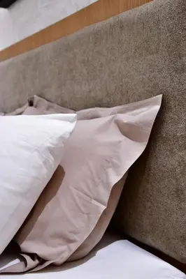 a pile of pillows sitting on top of a bed at Le Supreme Chic in Casablanca