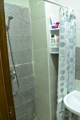 a bathroom with a shower and a sink at Havre de paix appartement in Mohammedia