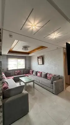 a living room with a couch and a table at Tamaris in Casablanca