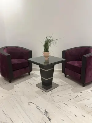 two chairs and a table with a potted plant on it at Stylish 2BR in Central Rabat with Panoramic View in Rabat